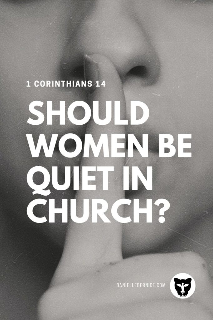 1 Corinthians 14 - Should women be quiet in church? Black and whit closeup of woman gesturing to be quiet.