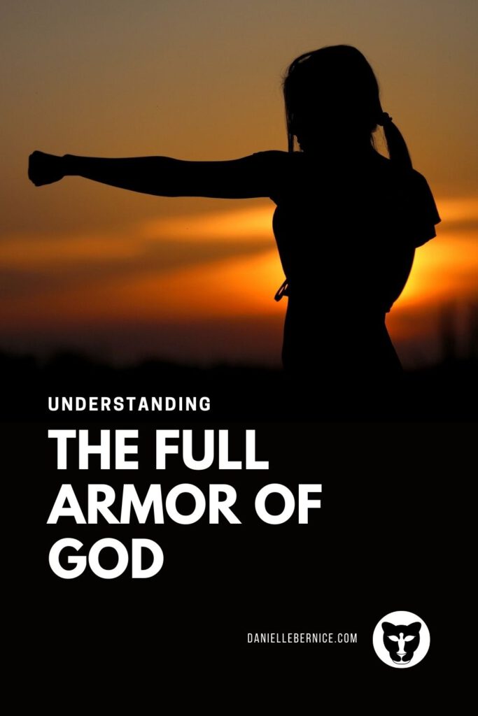 Understanding the full armor of God. Strong woman fighting in the sunset.