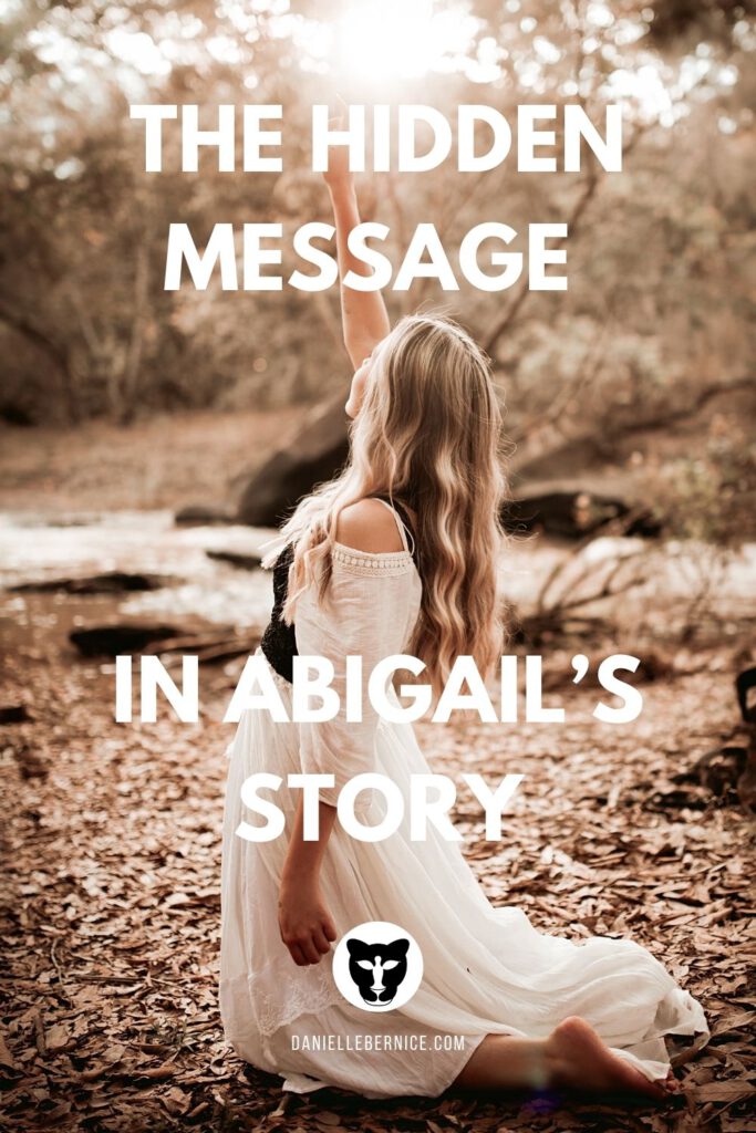 Photo of a woman in nature, on her knees, pointing to the sun in the sky. The text says, "The Hidden Message in Abigail's Story," DanielleBernice.com