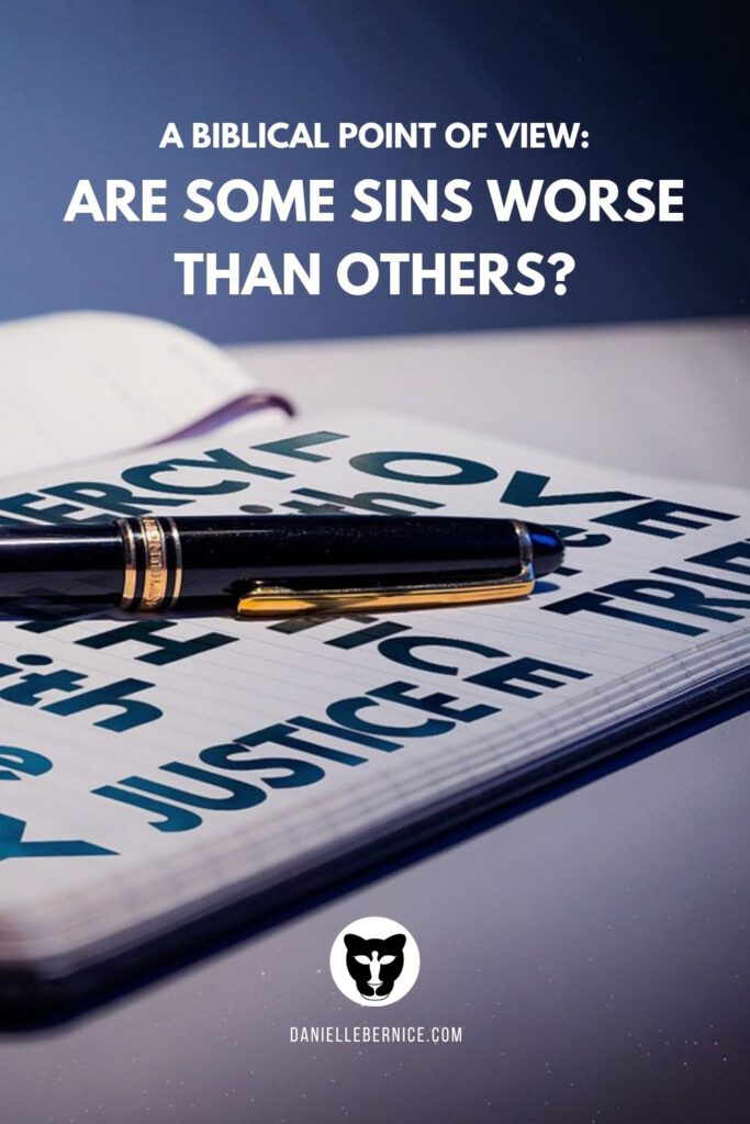 A picture of a notebook filled with words like justice, love, and mercy. There is a pen on the notebook and the text overlay reads: "A Biblical point of view: are some sins worse than others? DanielleBernice.com"